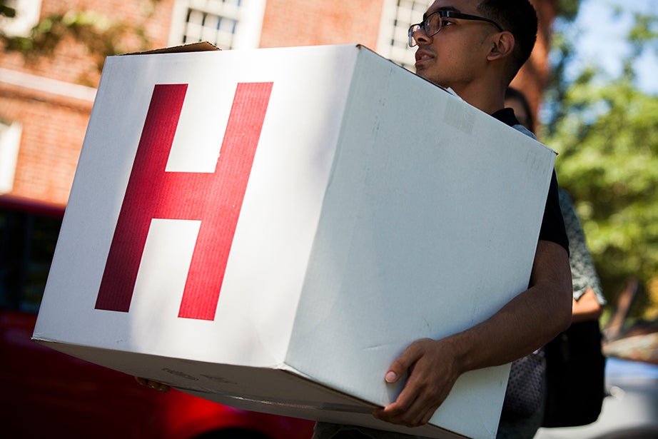 A crimson “H” marks a moving box. Stephanie Mitchell/Harvard Staff Photographer