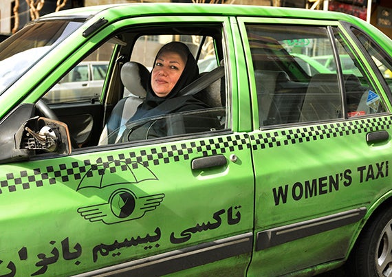 A Female taxi driver in Iran whose livery business exclusively caters to women.