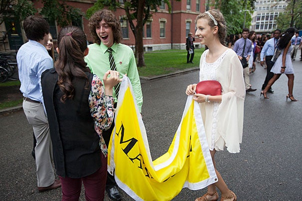 Harvard freshmen Nicky Hirschhorn, (from left, back to camera) Dylan Munro, (green shirt) and Molly Alter (right) enjoy Convocation in Memorial Church. Kris Snibbe/Harvard Staff Photographer