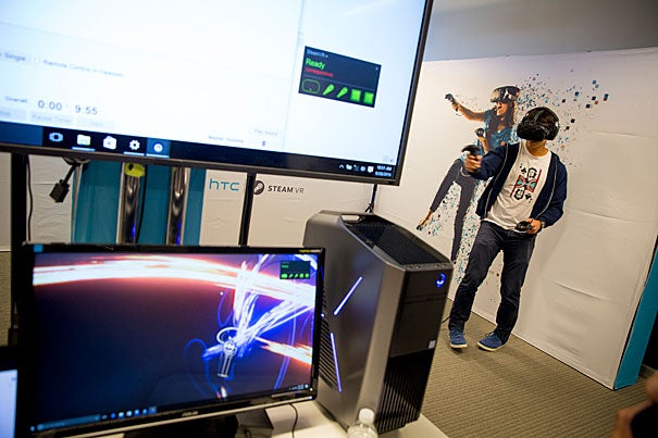 Harvard Business School student Brandon Tseng, M.B.A. '17, tries out virtual reality in the i-lab as part of HUBweek's augmented and virtual reality segment.