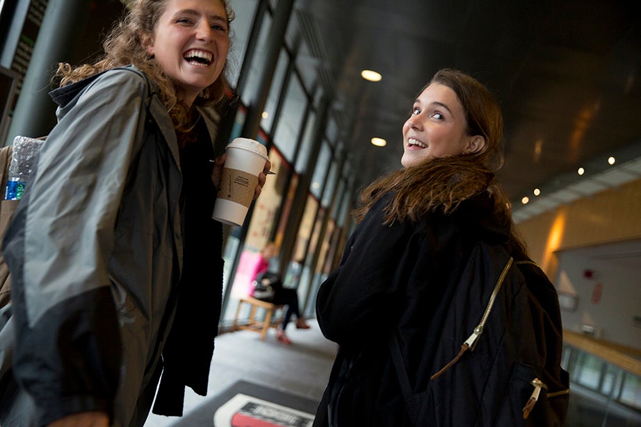 Friends since freshman year, Emily Jones (left) and Abigail Orlando finally have a class together. They head into Maxwell Dworkin during shopping week at Harvard. Rose Lincoln/Harvard Staff Photographer
