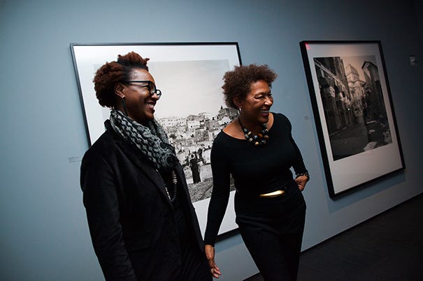 The first solo-artist show at the Ethelbert Cooper Gallery of African and African American Art is a thematic ensemble of provocative work from internationally acclaimed artist Carrie Mae Weems. Nikki Greene (left), assistant professor of art at Wellesley College, and Carrie Mae Weems are pictured during the opening event. Stephanie Mitchell/Harvard Staff Photographer