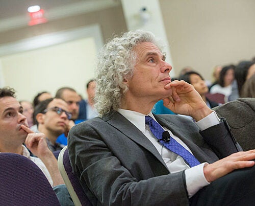 Steven Pinker, Johnstone Family Professor of Psychology, listens during the symposium "Behavioral Ethics" at the Spangler Auditorium. Pinker took part in a panel discussion with philosophers Joshua Greene and Peter Singer to discuss what society can do to create more ethical behavior. 