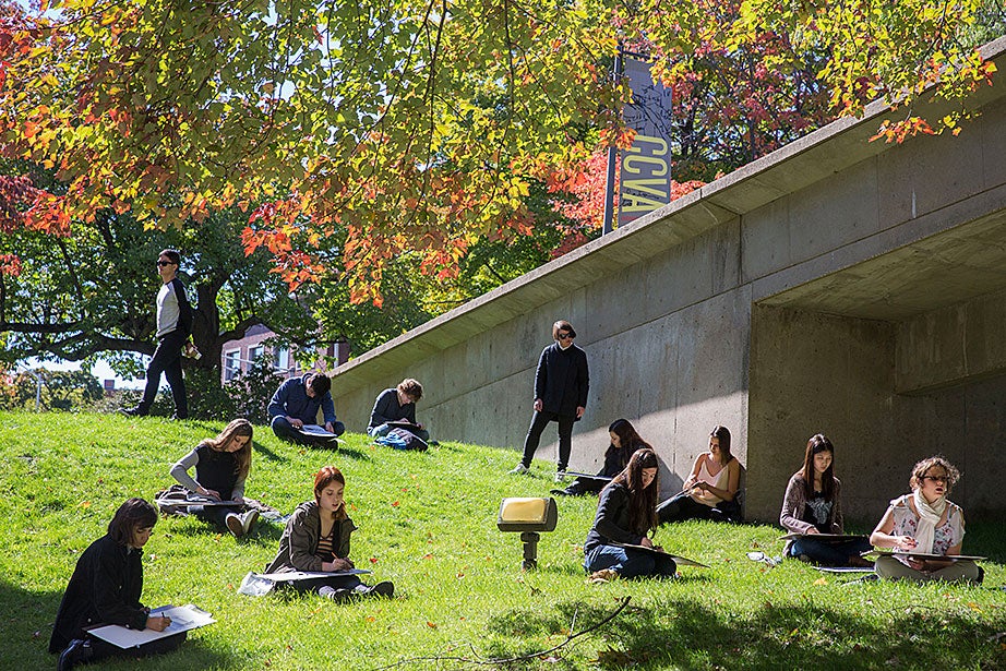 Katarina Burin (center) and Harry Choi '16, teaching assistant (upper left) support students as they create charcoal drawings of the Carpenter Center. “Teaching here is a very special experience, the building is one of the most beautiful and unique buildings in the world— I love that it is still being used for its original purpose” said Burin.