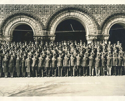 A photo from the exhibit "To Serve Better Thy Country," depicting ROTC cadets gathering for a photo in front of Crufts Laboratory, April 1944.