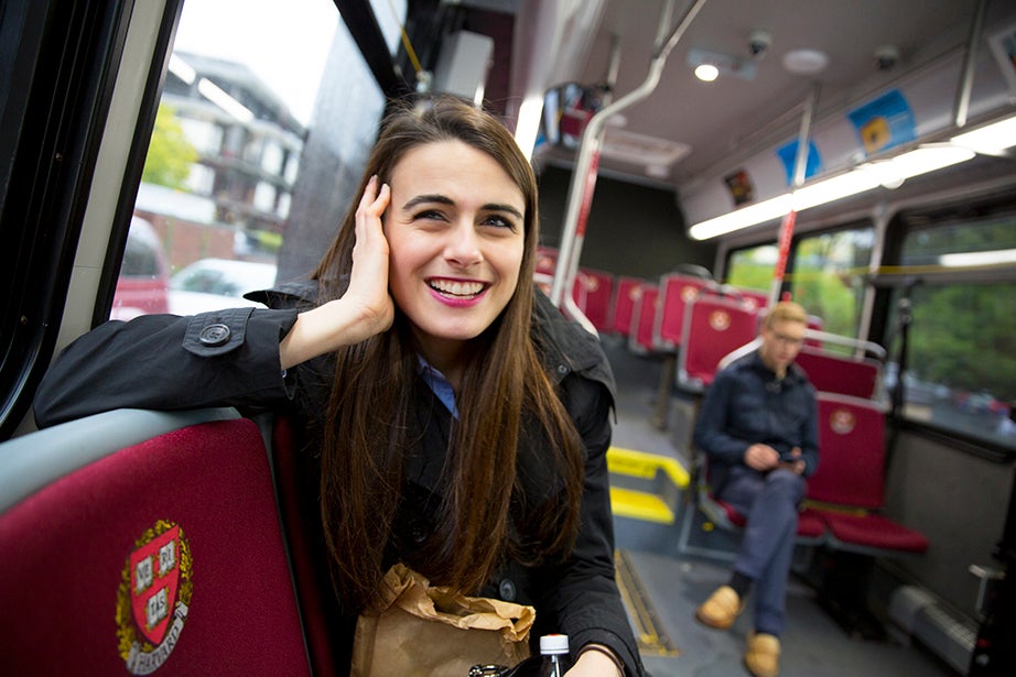 She rides the shuttle to Radcliffe Quad where she’ll meet with other public service agents looking to hire Harvard students.