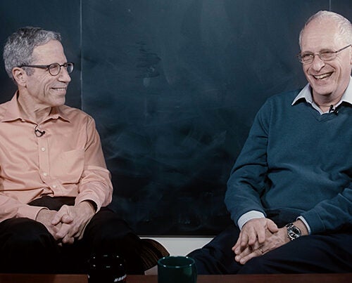 Harvard's Eric Maskin, Adams University Professor (left), and Oliver Hart, the Andrew E. Furer Professor of Economics, discuss life after winner a Nobel Prize. 