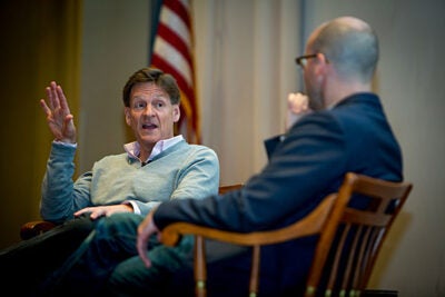 Author Michael Lewis (left) speaks about his new book "The Undoing Project" with Michael Norton, Harold M. Brierley Professor of Business Administration, which traces the 40-year relationship between Israeli-American psychologists Daniel Kahneman and Amos Tversky, who pioneered the social psychology study of decision making.