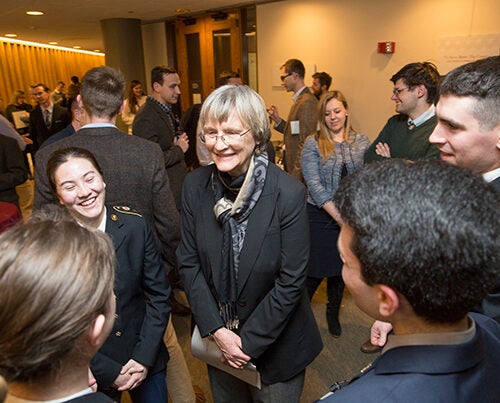 At the Pusey Library exhibit “To Serve Better Thy Country,” President Drew Faust greets ROTC undergraduates. As Harvard’s president, Faust has been instrumental in returning ROTC to the University.