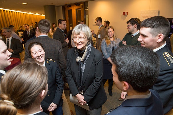 At the Pusey Library exhibit “To Serve Better Thy Country,” President Drew Faust greets ROTC undergraduates. As Harvard’s president, Faust has been instrumental in returning ROTC to the University.