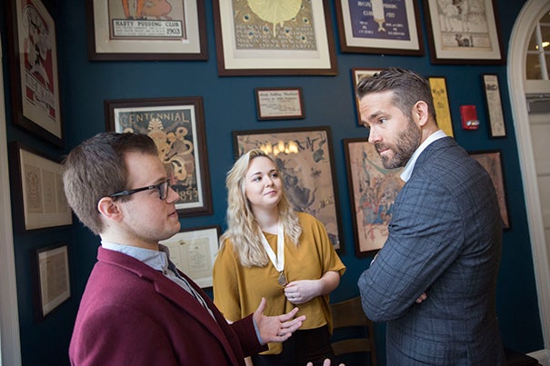 Lola Radev '19 and Derek Speedy '17 lead a tour for Hasty Pudding Man of the Year, Ryan Reynolds inside Farkas Hall where Hasty Pudding Theatricals members will roast the actor before honoring him with an award. Kris Snibbe/Harvard Staff Photographer