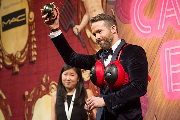 Hasty Pudding's Man of the Year Ryan Reynolds receives his pudding pot during the Friday night roast.  