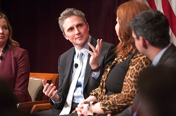 James Pethokoukis (Columnist and Blogger, American Enterprise Institute), talks with April Ponnuru (second from the right) and Oren Cass during a panel about the future of the conservative agenda for America. The panel is hosted in the JFK JR Forum. Photo by Silvia Mazzocchin