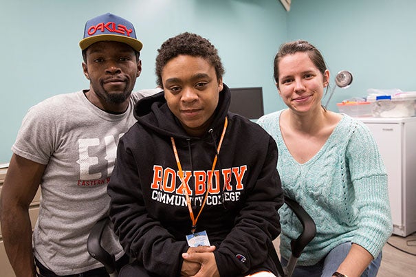 Y2Y homeless shelter guests Dorell B. (from left) and Janet B. pose with 5th year GSAS student Sam Wellington. Y2Y is a student-run homeless shelter, founded and staffed by Harvard students, that caters exclusively to young adults.