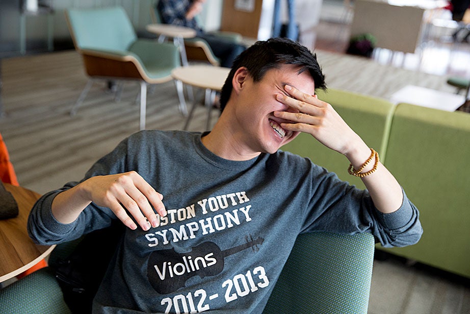Kevin Yang ’17 shares a laugh of frustration while trying to solve a problem.