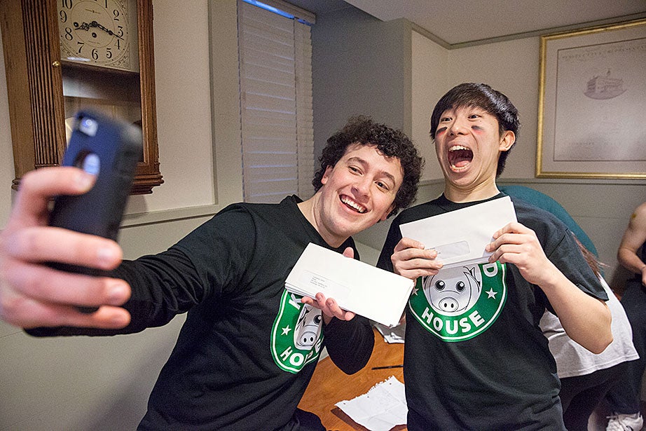 Kirkland House members Chris Dolliff ’18 (left) and Hendong Park ’18 take a selfie in University Hall before heading to the dorms with their letters for freshmen. Jon Chase/Harvard Staff Photographer