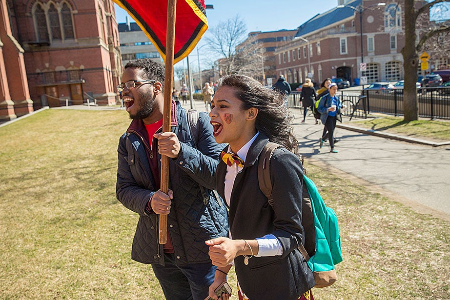 Adams House residents Christopher Johnny ’18 (left) and Tasnim Ahmed ’17 welcome students to their House while celebrating Housing Day at Annenberg Hall. Kris Snibbe/Harvard Staff Photographer