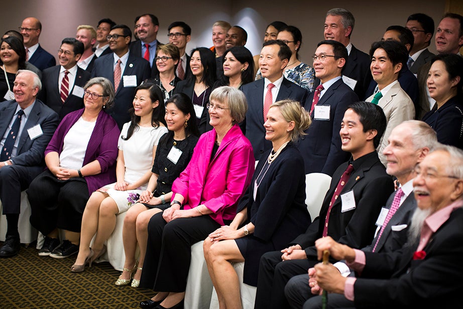 Harvard President Drew Faust meets with Asia Club leaders at a reception before the Your Harvard Singapore program.