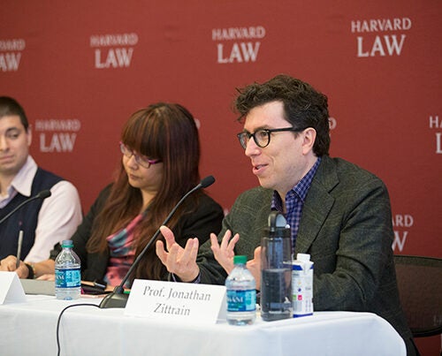 At a panel discussion at the Berkman Klein Center on the pervasiveness of fake news, Jonathan Zittrain (right) said that people have lost faith in the credibility of the "mainstream news" while the abundance of sources that cater to preconceived notions have made it "hard to tell the reliable stuff from the nonreliable stuff.” Fellow An Xiao Mina and MIT Ph.D. candidate Nathan Matias (left) listen on.