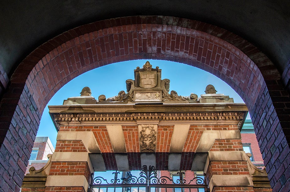 The Class of 1889 Gate, South, is crowned by the arched tunnel that crosses Wigglesworth Hall. This gate was planned as a twin to the Dexter Gate, but the latter’s slight differences gave it more fame.
