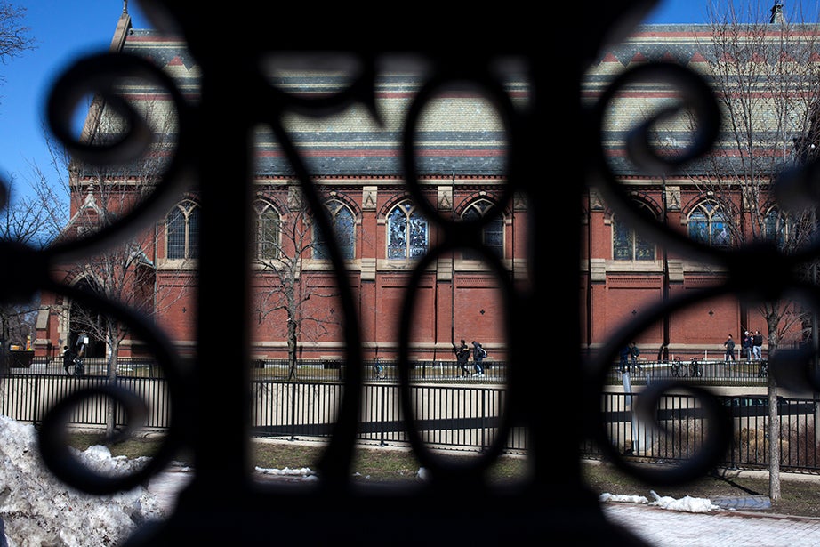 The Class of 1887 Gate, North. The 87 of the wrought-iron gate frames students walking by Annenberg Hall. 
