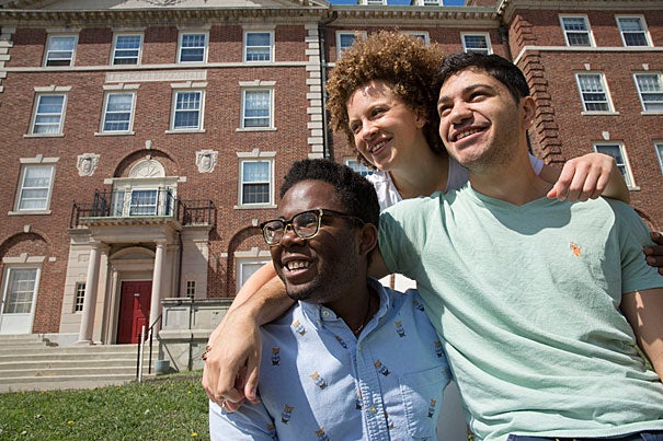 Amanda Beattie and her friends, Tyrik LaCruise (left) and Yamen Abbas, all Class of 2017, spend some quality time together in the Radcliffe Quad during their last weeks at Harvard College.
