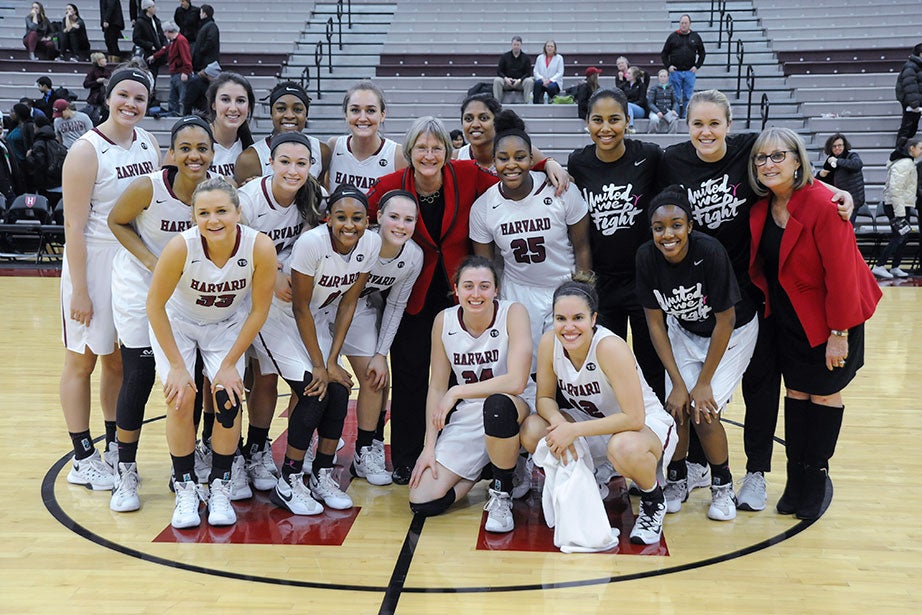 A team photo with President Faust as honorary coach for the Harvard women’s basketball team. The February 2016 game against Columbia ended in a 84-54 win for Harvard. Jon Chase/Harvard Staff Photographer