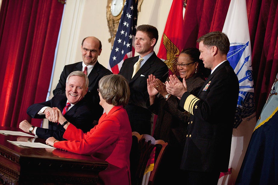After a 40-year hiatus, Faust initiates the reinstatement of a Reserve Officers’ Training Corps (ROTC) program on campus, signing an agreement with Navy Secretary Ray Mabus, J.D. ’76, in March 2011. Harvard signed similar agreements to reinstate Army ROTC in 2012 and Air Force ROTC in 2016.  Stephanie Mitchell/Harvard Staff Photographer