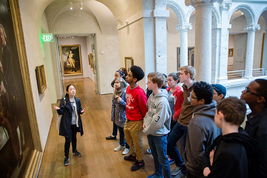 Jessica Paik (left), a graduate student teacher, engages in a lively discussion with Cambridge Rindge & Latin students visiting the Harvard Art Museums, which reopened after major renovations in 2014 in a state-of-the-art, light-filled building designed by architect Renzo Piano. In line with Harvard’s commitment to sustainability, the museums’ renovation and expansion achieved LEED Gold certification for incorporating a wide range of green building technologies including, energy-efficient LED bulbs and an innovative water conservation system. Kris Snibbe/Harvard Staff Photographer