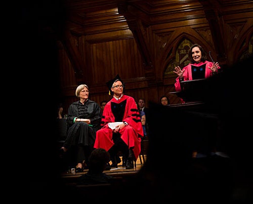 President Drew Faust (from left) and Robin Kelsey, dean of arts and humanities, listen as Sherry Turkle delivers the oration at the Phi Beta Kappa Literary Exercises. "Life teaches that presence matters," said Turkle. "People respond to commitment and deliberateness.”