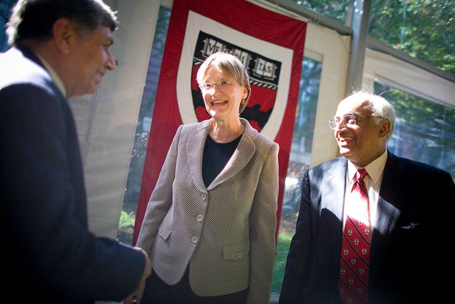 President Faust (center) oversees the formation of the School of Engineering and Applied Sciences (SEAS)—the first new Harvard School since 1936. Dean Venkatesh “Venky” Narayanamurti (right), first dean of SEAS, is pictured here with Ashok Misra of the Indian Institute of Technology Bombay. In 2015, the School was renamed the Harvard John A. Paulson School of Engineering and Applied Sciences in recognition of Paulson's transformative $400 million gift. Photo by Justin Ide