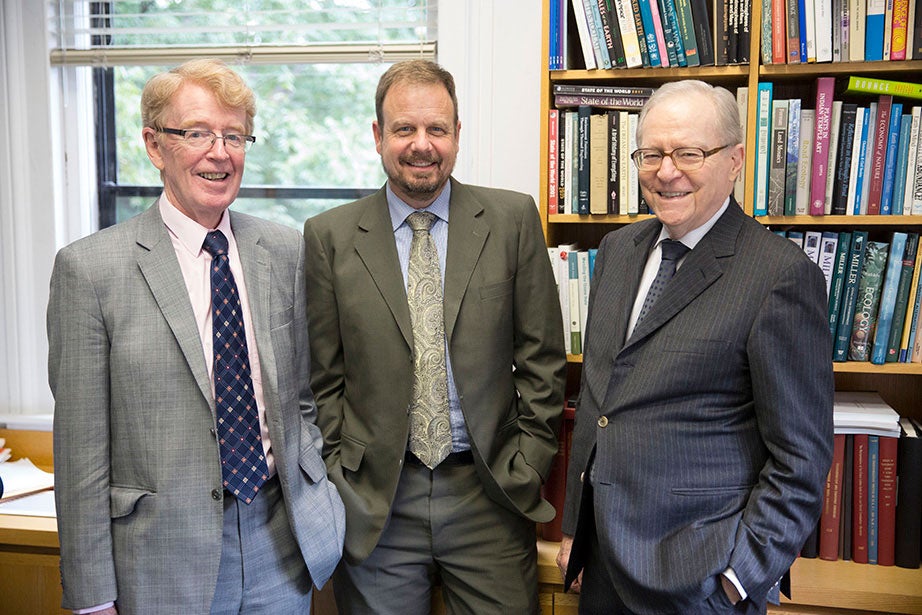 A multidisciplinary, collaborative project to investigate climate change, energy security, and sustainable development in China receives the first $3.75 million grant from the new Harvard Global Institute (HGI) in October 2015. The project will be headed by economist Dale Jorgenson (right), atmospheric scientist Michael McElroy (left), and Chris Nielsen. The HGI was launched by President Faust to support research initiatives that deepen Harvard’s international engagement and promote University-wide scholarship to address pressing global challenges. Kris Snibbe/Harvard Staff Photographer