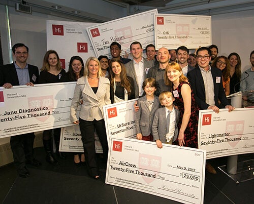 Jodi Goldstein (white jacket), managing director of the Harvard Innovation Labs, poses with all of the 2017 President’s Innovation Challenge winners.