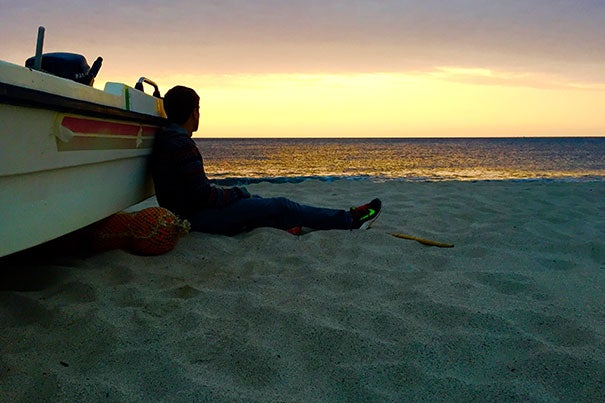 Danny Banks '17 watches the sun rise over the Ionian Sea from the Mare Nostrum beach in the resort town Soverato, a town in the Calabria region of southern Italy, where he was doing research for his senior thesis.