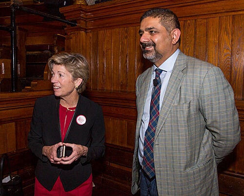 Harvard CIO Anne Margulies chats with Karim R. Lakhani, professor of business administration at the Business School, before his afternoon keynote address at the annual IT Summit.