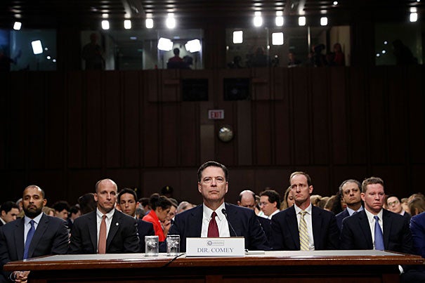 Former FBI Director James Comey listens to opening remarks at Thursday’s  Senate Intelligence Committee hearing.