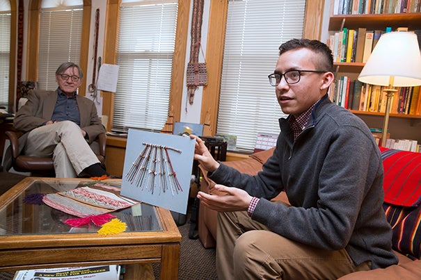 A study by Manny Medrano '19 (from right), with guidance from Professor Gary Urton, has decoded the meaning behind khipus, an Incan bookkeeping method of knotted rope.