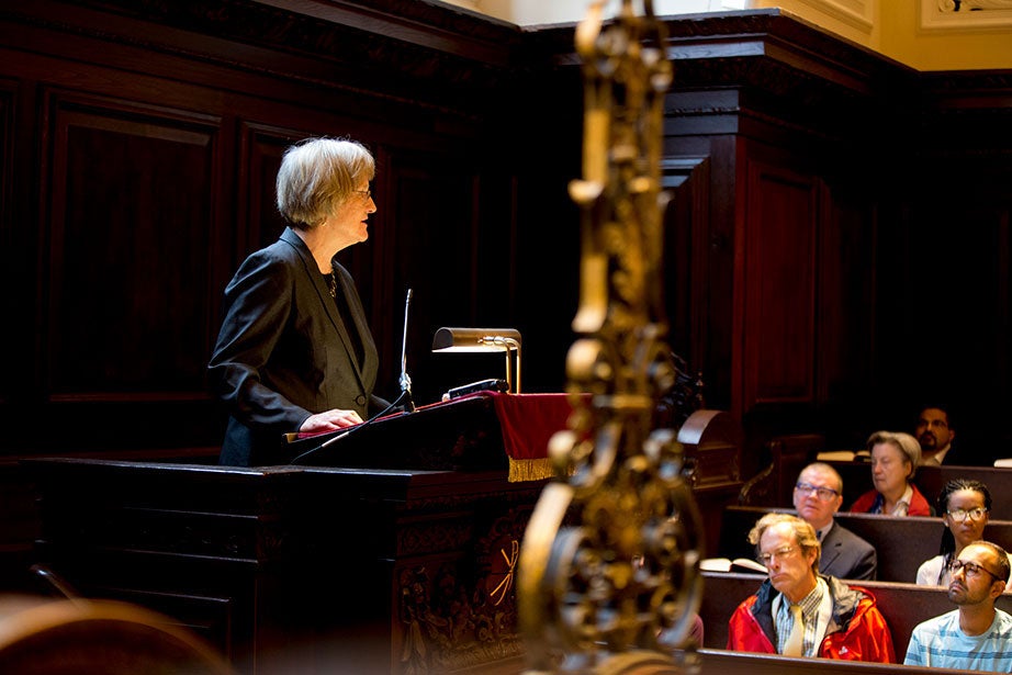 Drew Faust offers the first morning prayers of the academic year.