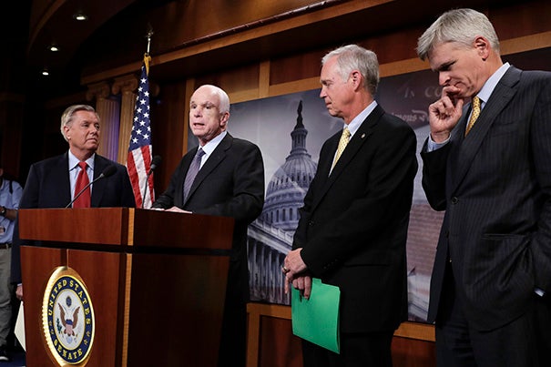 Republican Senators (from left) Lindsey Graham, John McCain, Ron Johnson, and Bill Cassidy speak  following the failure of the GOP-led congress to repeal the ACA. A bipartisan compromise appears likely despite opposition from President Trump.