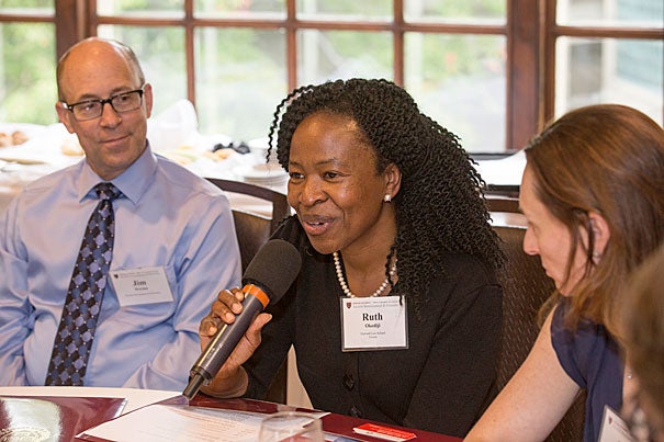 Ruth Okediji, center, Jeremiah Smith, Jr. Professor of Law at HLS. Judy Singer's office hosts new faculty at the Faculty Club..Jon Chase/Harvard Staff Photographer
