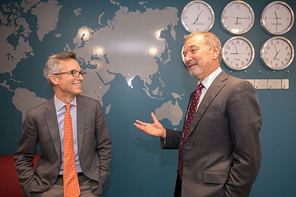 Stephen Greenblatt and Dean Robin Kelsey chat about Greenblatt's new book "The Rise and Fall of Adam and Eve" in the lobby of Harvard Global Support Services.