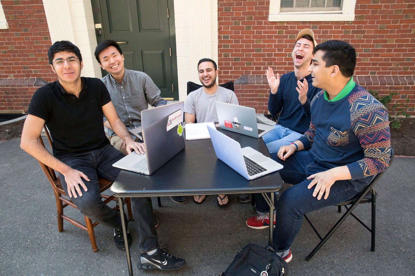 Roommates in Wigglesworth sit outside their dorm on what they call their "porch": (l to r) Soheil Sadabadi '20 (Iran), Andrew Cho '20 (AZ), Michael Shadpour '20 (CA), Scott Kall '20 (MA), and Arpan Sarkar '20 (TN).