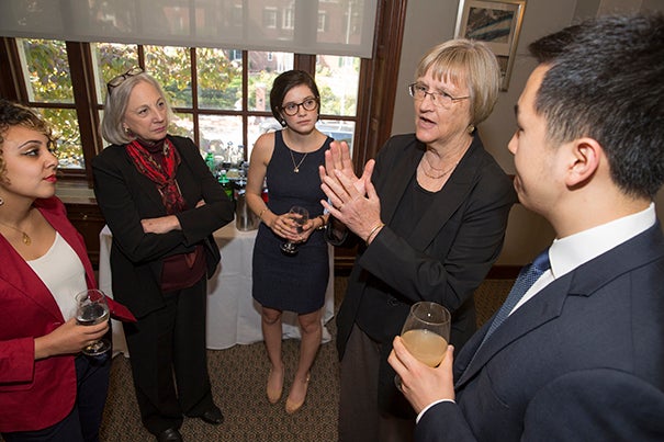 President Faust speaks with Lamees El-Sadek, Dr.P.H. '19 (from left), Robin Mount, director of FAS Office of Career services, Juliet Lewis '18, and Christopher Higginson '18 at the Annual luncheon for recipients of the Presidential Public Service Fellowship.