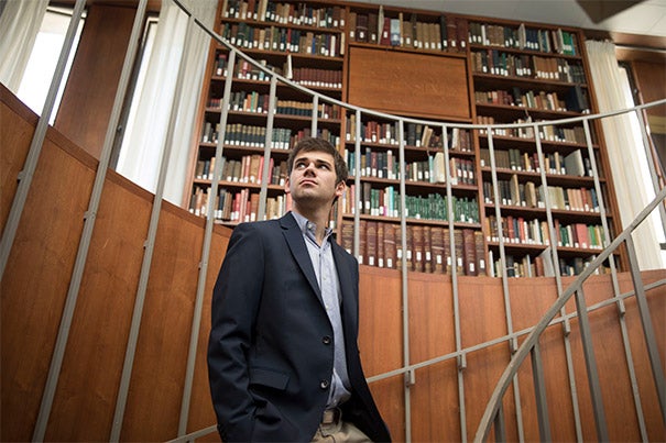 Matt DeShaw '17 is seen at the Leverett House Library at Harvard