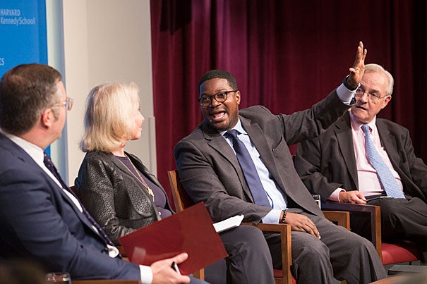 At "The Lure of the Prosperity Gospel in the Age of Trump," panelist Jonathan Walton (center)  and E.J. Dionne (right) discussed the paradoxes of the evangelical tradition and how Trump has capitalized on its appeal to both rich and poor.