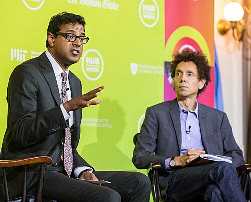 At a HUBweek event in Faneuil Hall, Atul Gawande (left) and Malcolm Gladwell discuss the use of checklists and other systems interventions to reduce lethal mistakes in the medical practice.