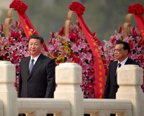 Chinese President Xi Jinping (left) is likely to begin his second term as general secretary of the Communist Party as the nation prepares to solidify its status as a global leader.