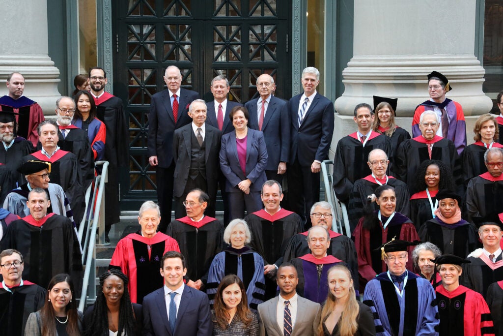 On the steps of Langdell Library, Harvard Law School faculty surround six Supreme Court justices.