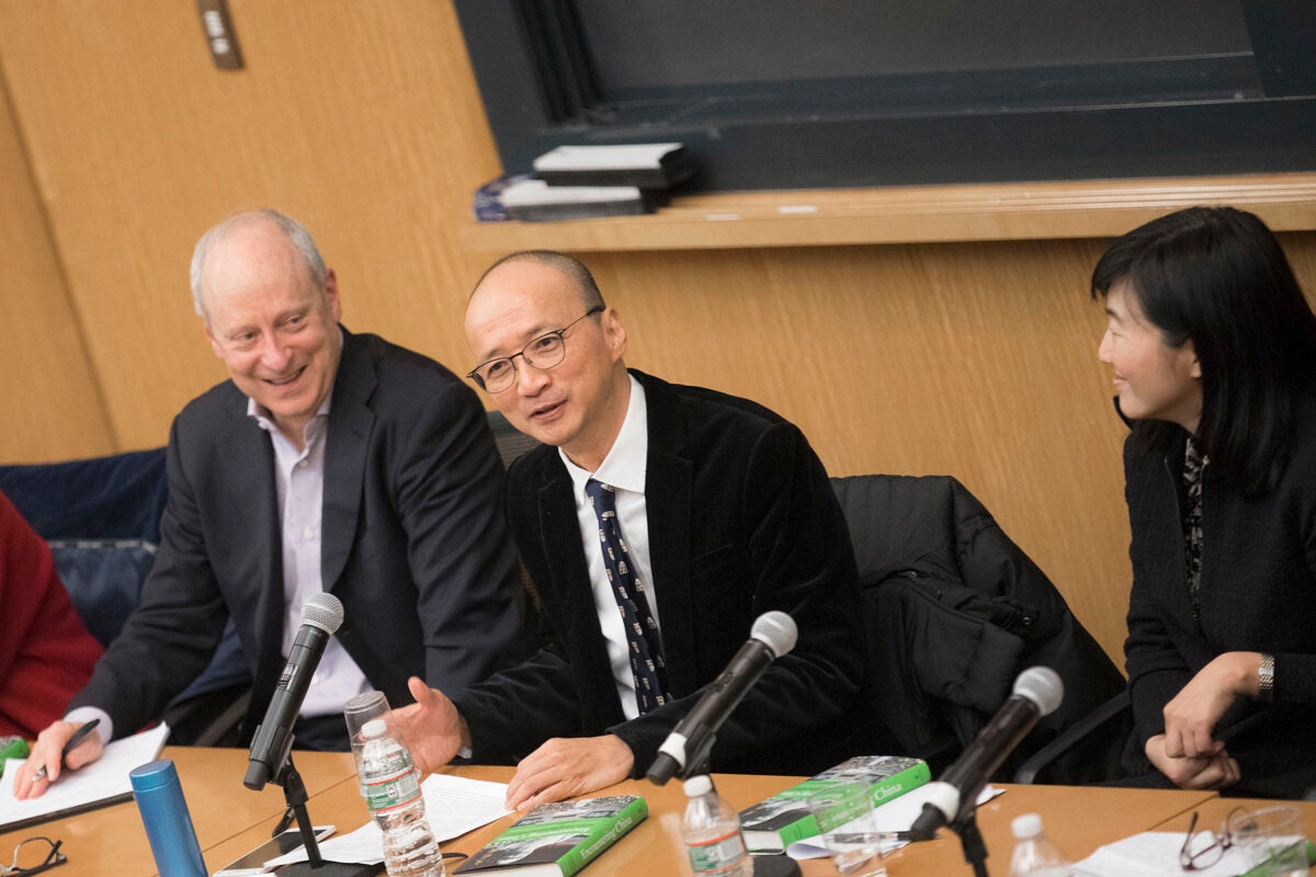 Michael J. Sandel (left) discusses Confucian and Daoist traditions with Joseph C.W. Chan. The event marks the publication  of "Encountering China: Michael Sandel and Chinese Philosophy," a collection of essays.