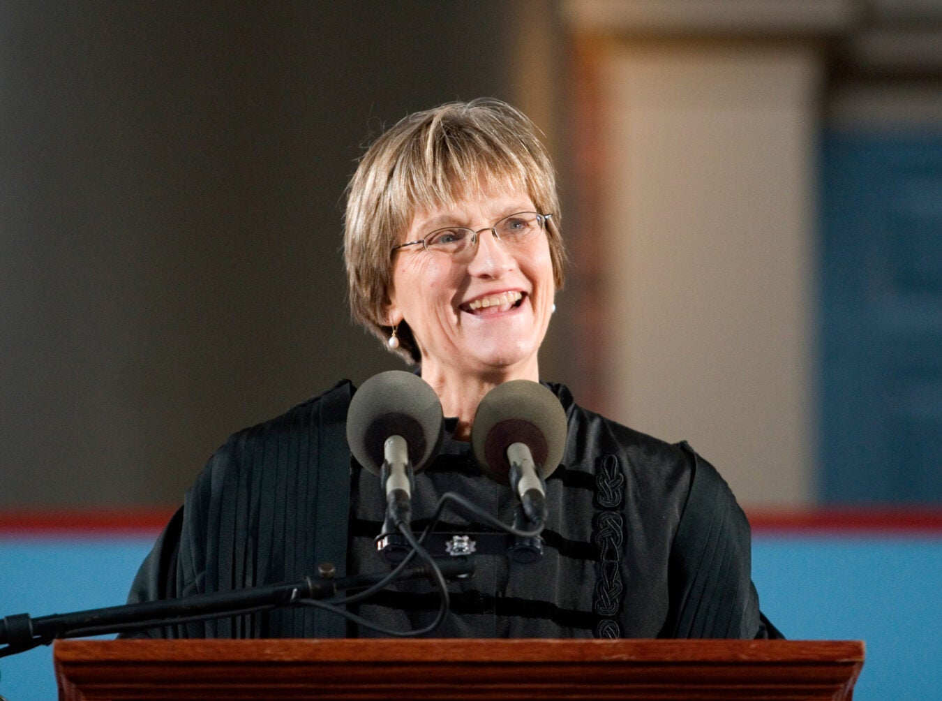 Drew Faust at podium during installation as Harvard president.